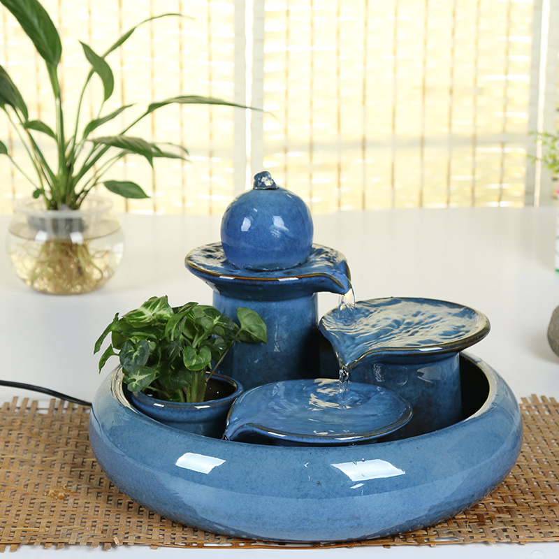1777549538_364315434.jpg Living Room Ceramic Home Decorations Creative Flowing Water Fountain Feng Shui Wheel Fish Tank Humidifier Moving Gift - Image 1